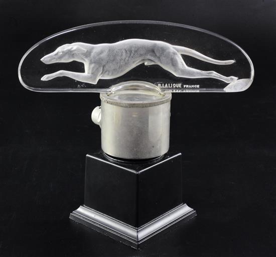 Levrier/Greyhound. A glass mascot by René Lalique, introduced on 14/3/1928, No.1141 Height with mount 10.5cm. overall 17.5cm.